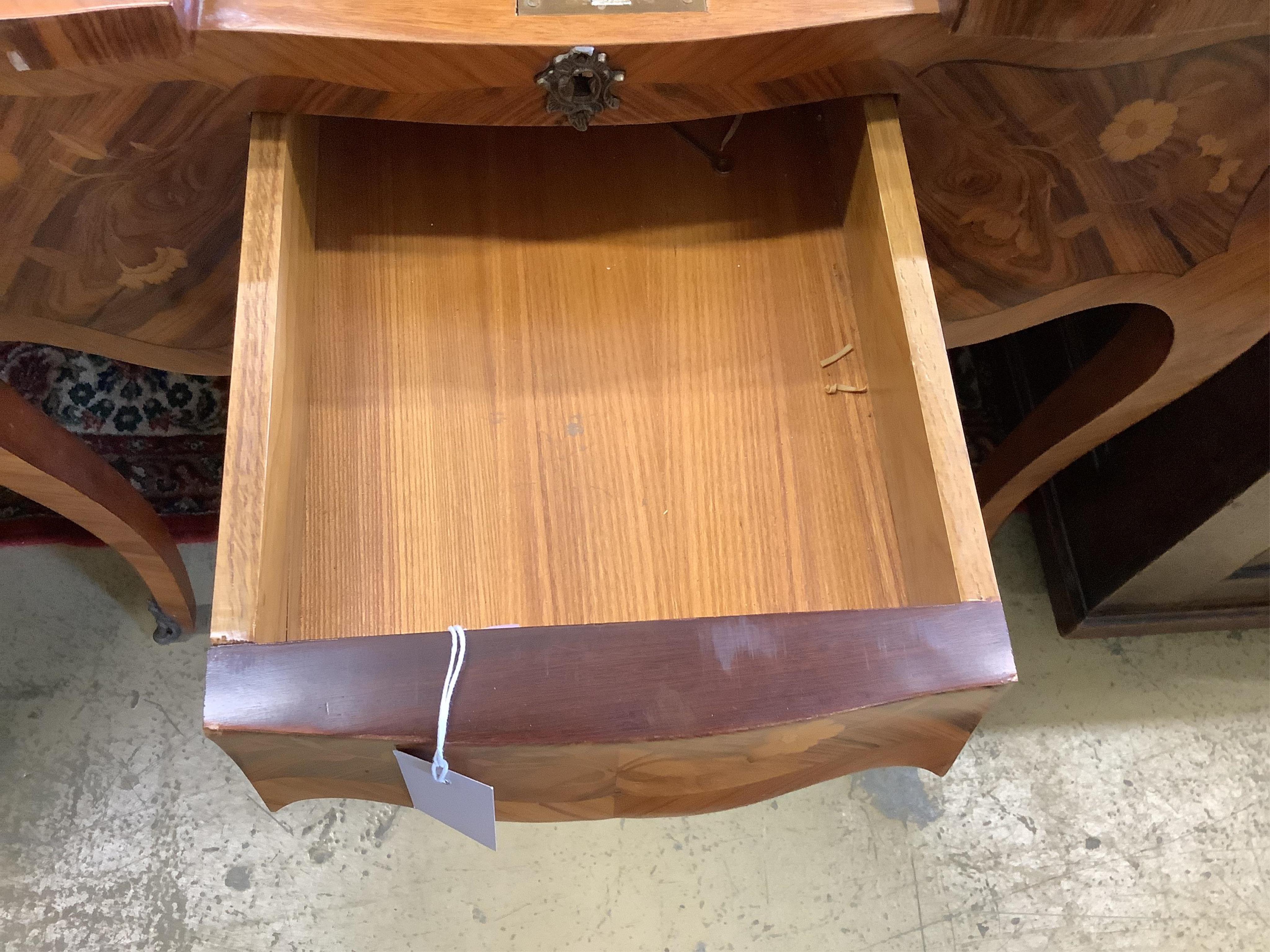 A French marquetry inlaid kingwood poudreuse, width 82cm, depth 36cm, height 74cm. Condition - good